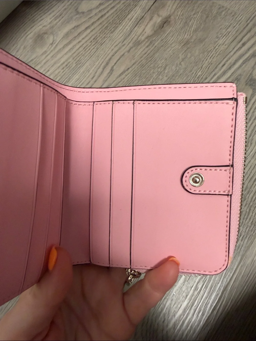 kate spade Pink Compact Zip Wallet with Gold Logo
